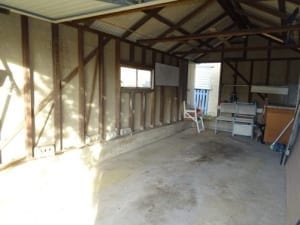 Old garage with Asbestos roof and wall linings