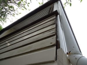 Queenslander style house with faulty and rotting weatherboards