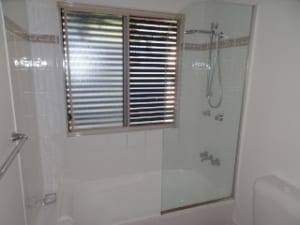 Leaking around window installed within a shower